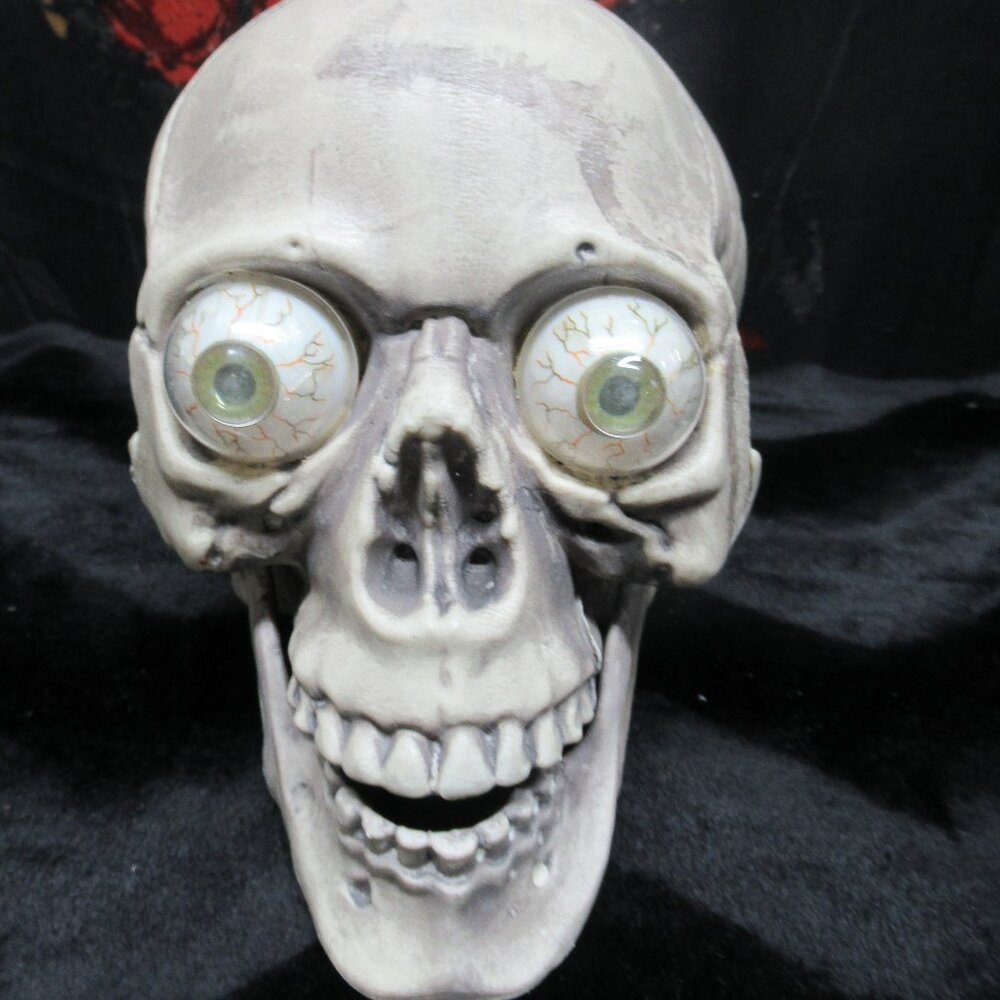 Halloween Skull with Light Up Color Changing Eyes